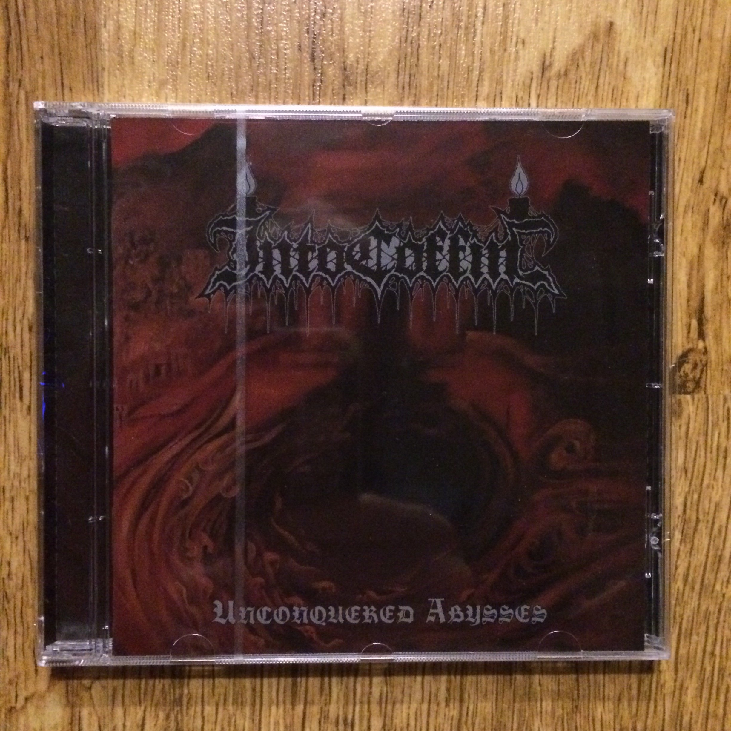 Photo of the Into Coffin - "Unconquered Abysses" CD