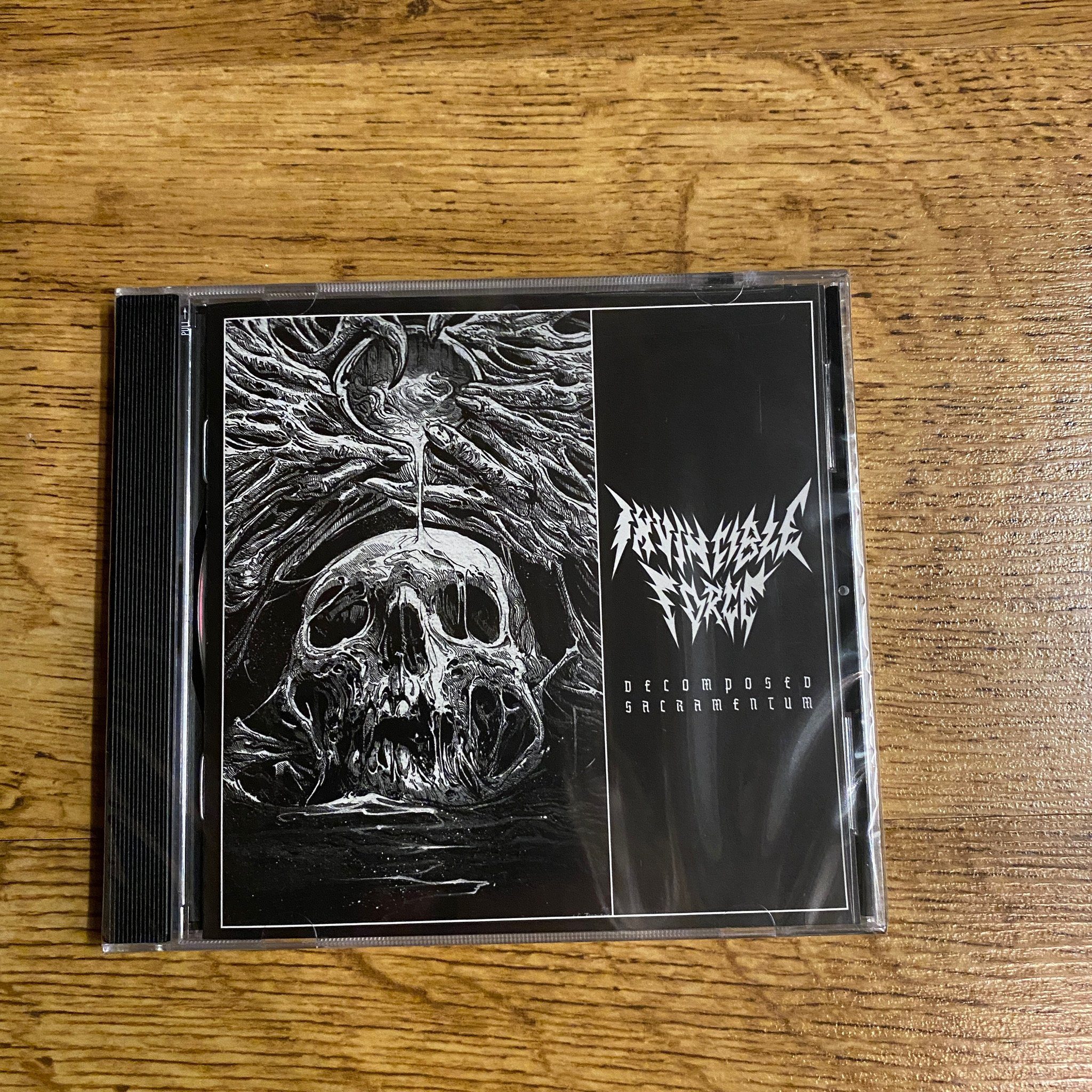 Photo of the Invincible Force - "Decomposed Sacramentum" CD